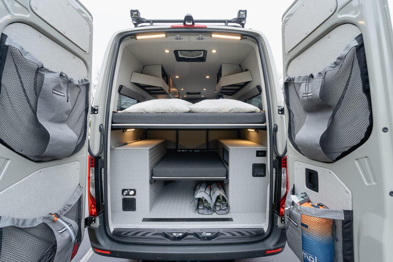 custom van conversion Tumbleweed 2021 mercedes benz sprinter 170 4wd seat four sleep three rear garage door stuff sacks