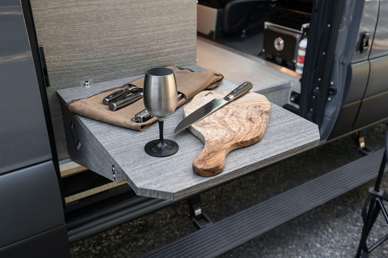custom van conversion OBI 2022 mercedes benz sprinter 170 4wd seat three sleep three passenger slider galley kitchen