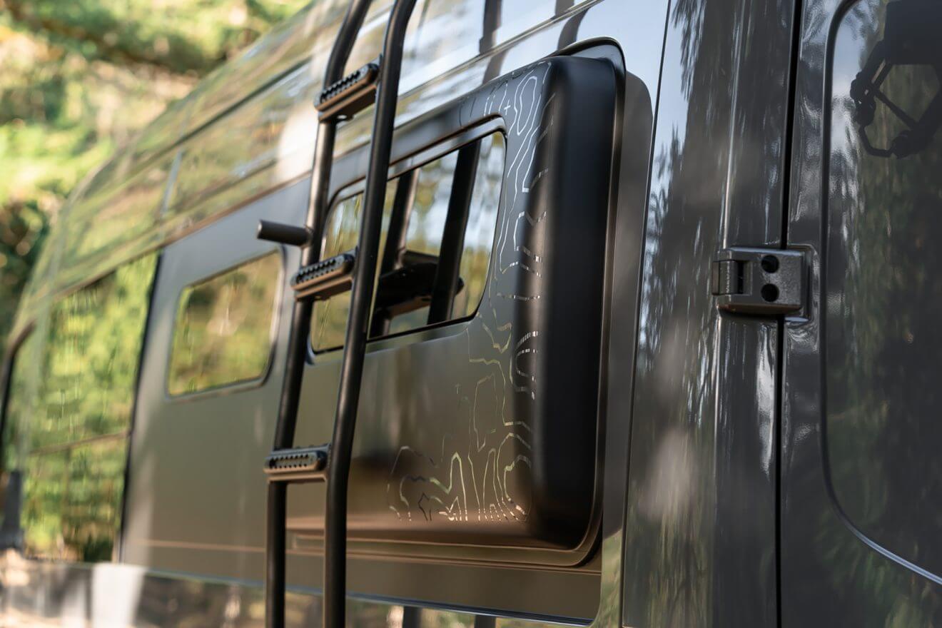 custom van conversion OBI 2022 mercedes benz sprinter 170 4wd seat three sleep three exterior rear driver side utility ladder side ladder flared bump out