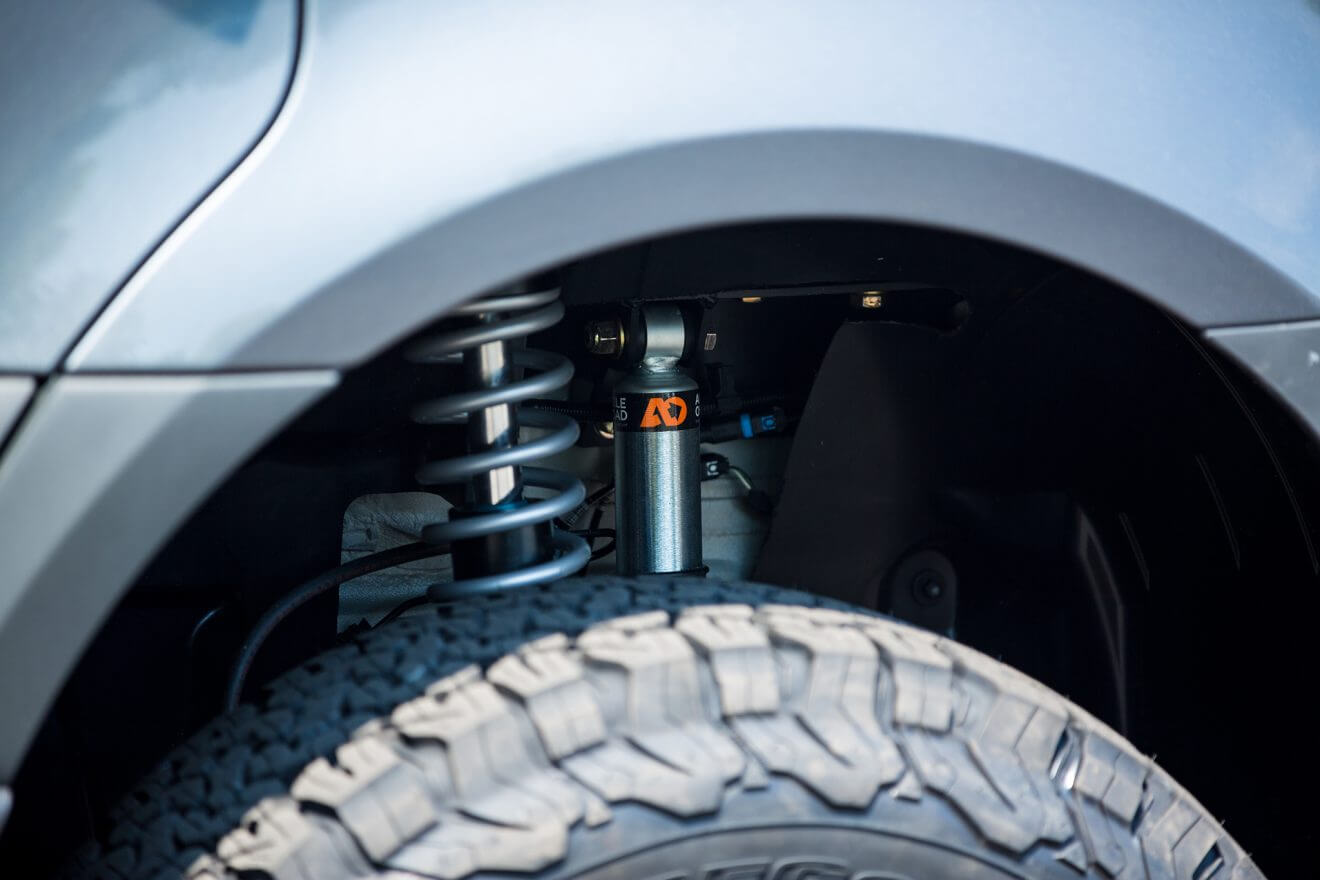 Detail of fox factory suspension on custom off road sprinter van