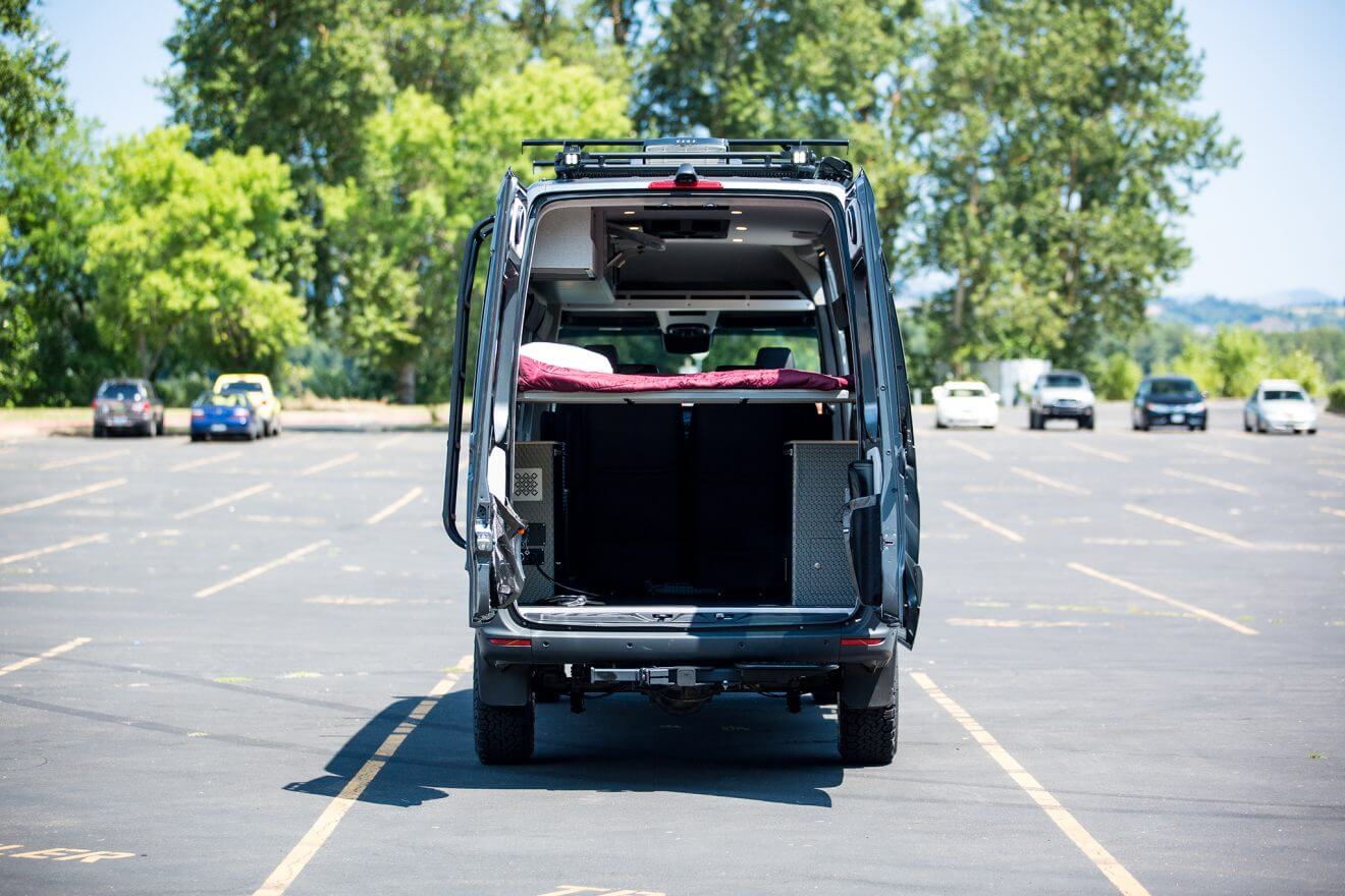 Eight seat custom sprinter van interior through rear doors