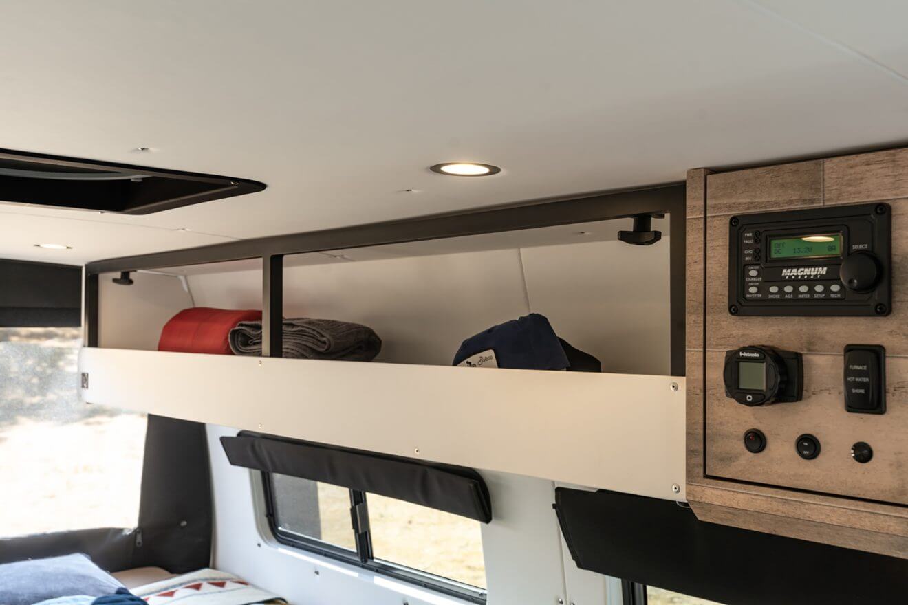 custom van conversion distillation 2022 mercedes benz sprinter 170 4wd seat two sleep three custom overhead cabinetry enclosed cabinet exoskeleton