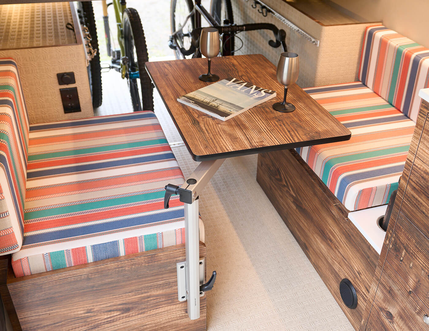 Beachfront is a custom van built in Portland Oregon by Outside Van. It has a colorful and warm interior