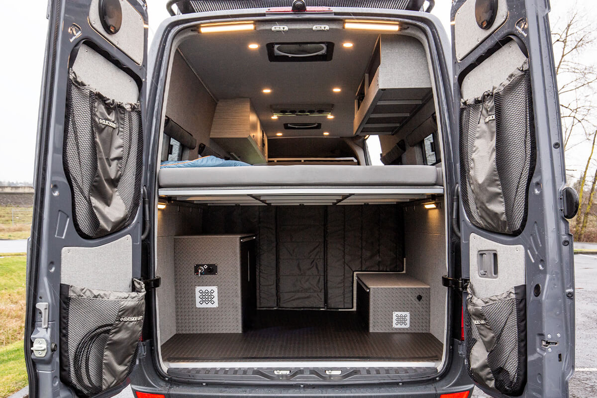 WyEast is an Outside Van camping van. Seating and sleeping for 2, galley and exterior shower