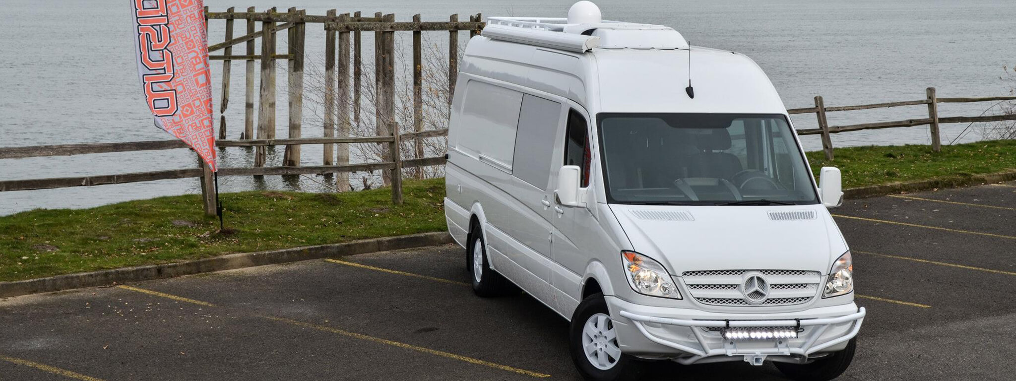 170" 2WD Outside Van moto conversion called Whiteout. seating for 7 sleeping for 4