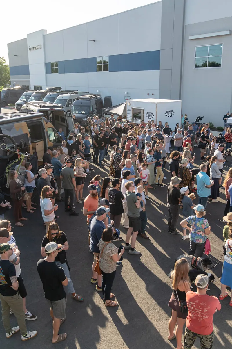 OutsideVan_EndofYear_OpenHouseCrowd