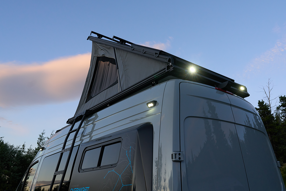 OutsideVan_Overnight_SuperPacific_CloudCap_Lights92_Web Outside Van Overnight Super Pacific Cloud Cap Pop-Top